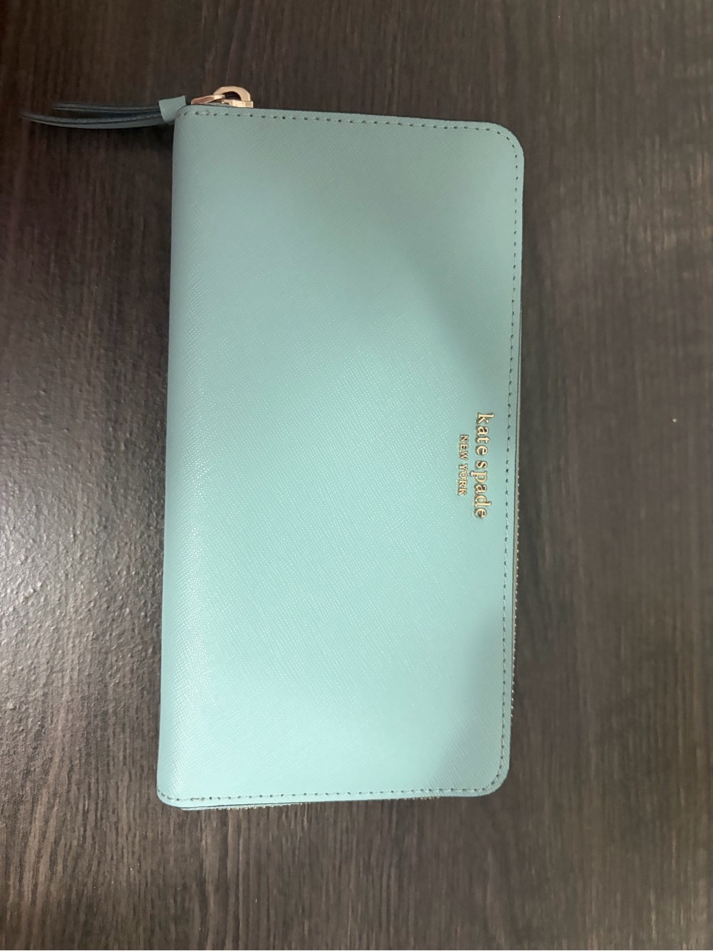kate spade zip-around large wallet in Aqua blue